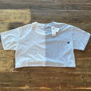 Hollister NWT oversized cropped T-shirt in size small.